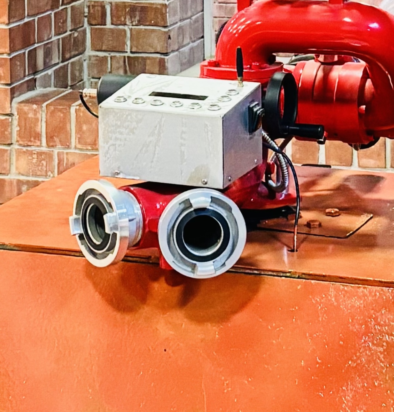 Close view of FireGuard's twin water inlets and monitor control housing